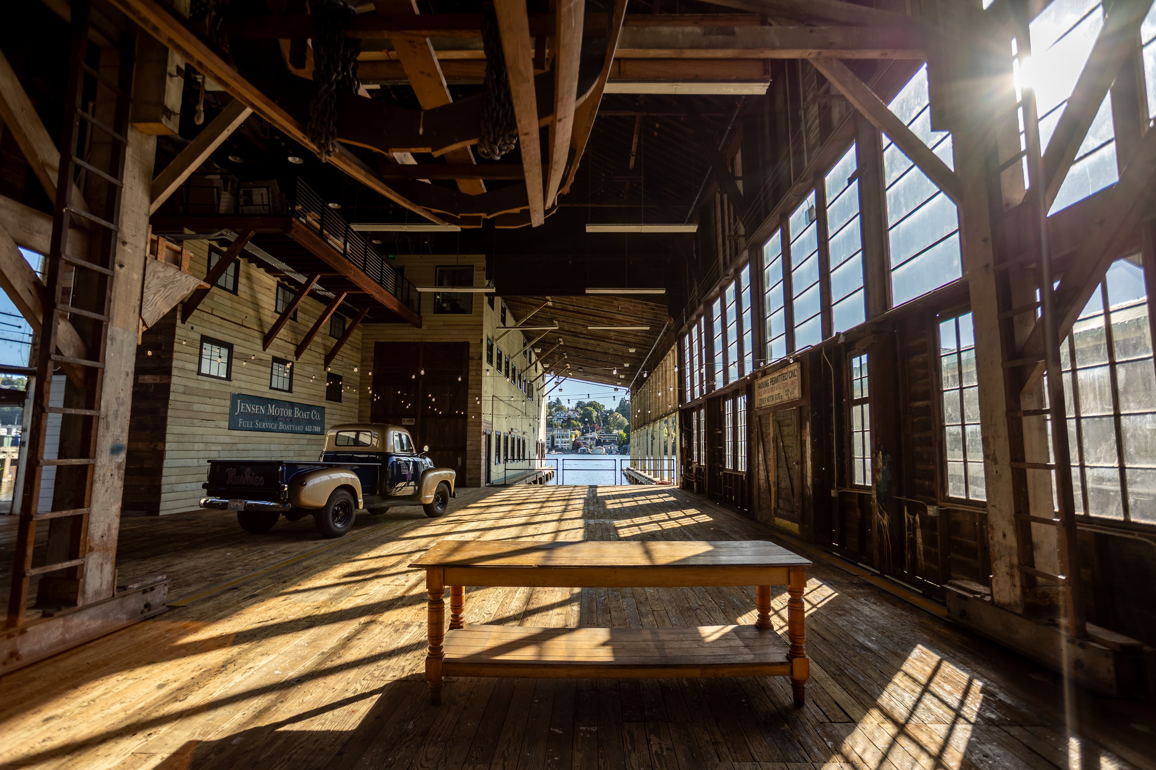 Inside the covered barn looking out toward the dock and Portage Bay